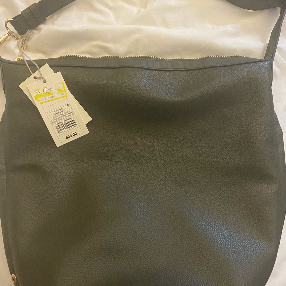 Green sling backpack/shoulder bag